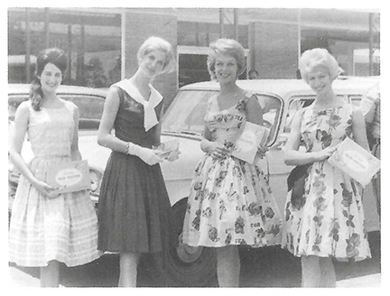 Beauty queens display Stuckey’s candies in front of the Folkston, GA, Pecan Shoppe